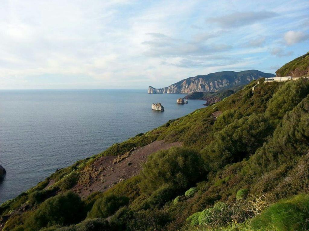 Le Caravelle Villa Portoscuso Bagian luar foto